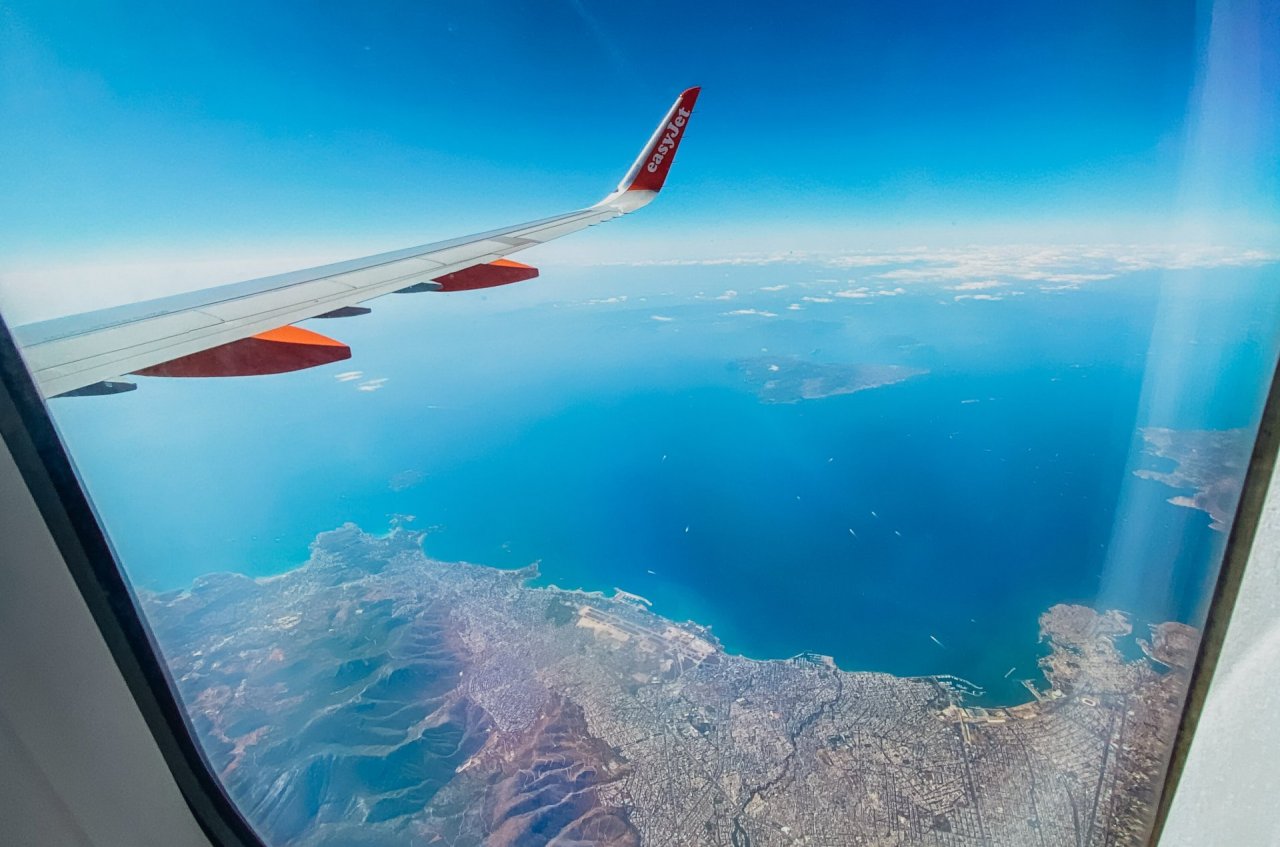 A view of the amazing landscape and sea of Greece from the plane 